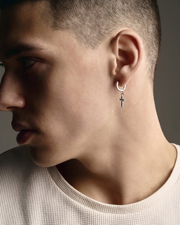 14k white gold single earring CROSS. BLACK STONES