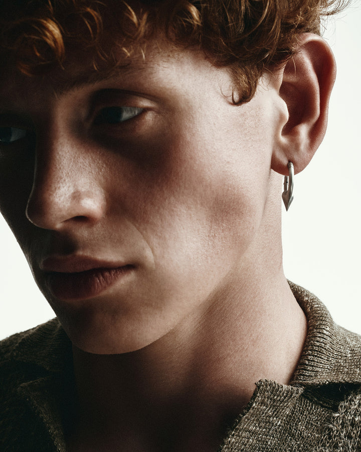 Silver single earring REBELLION