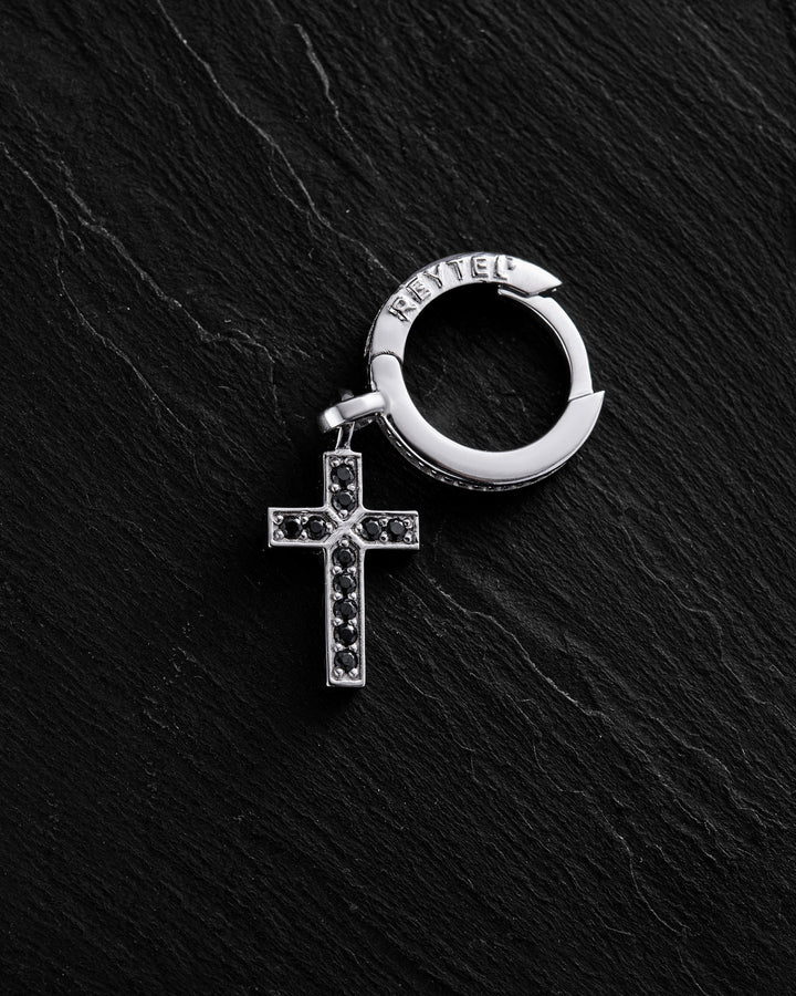 14k white gold single earring CROSS. BLACK STONES