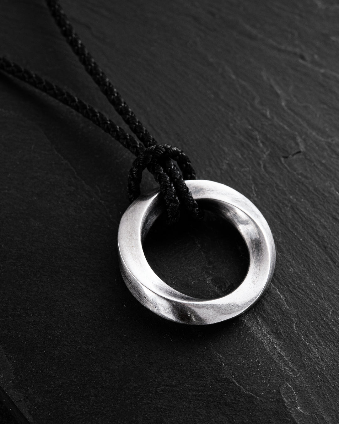 Silver pendant INFINITE LOOP (on cord)