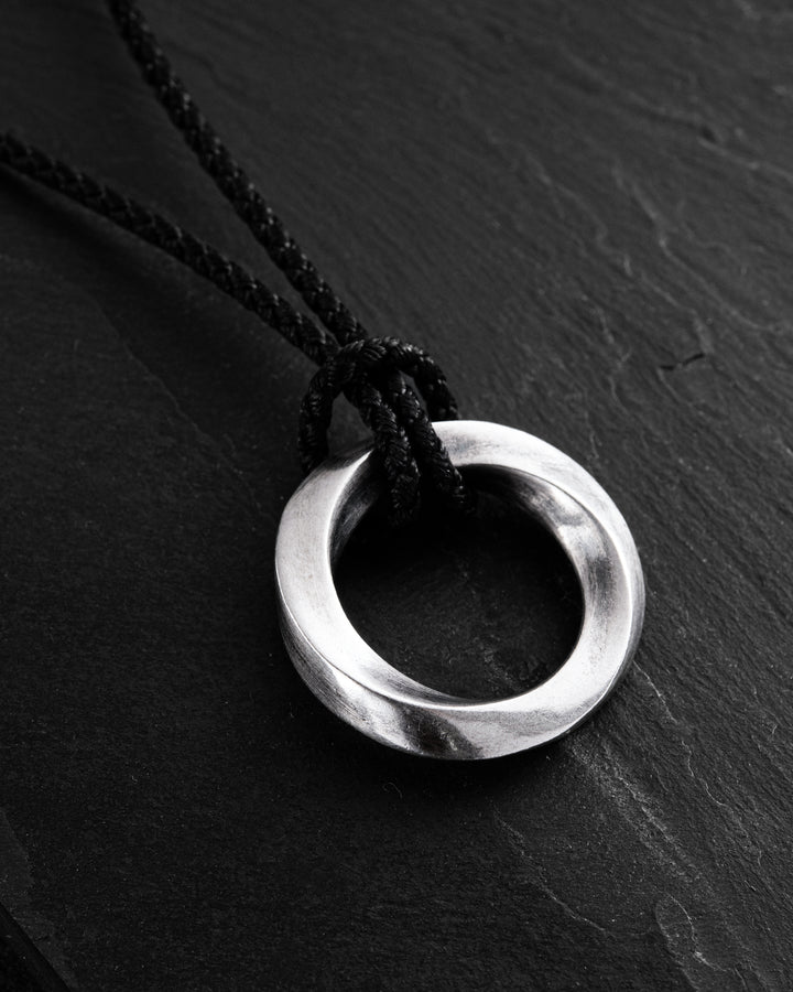 Silver pendant INFINITE LOOP (on cord)