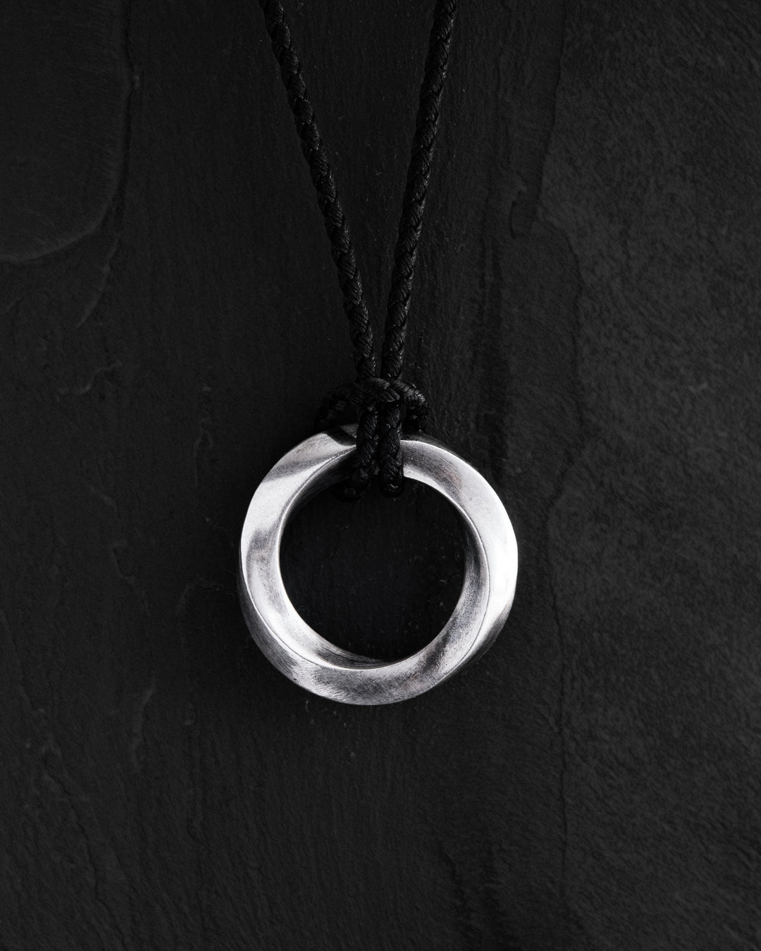 Silver pendant INFINITE LOOP (on cord)