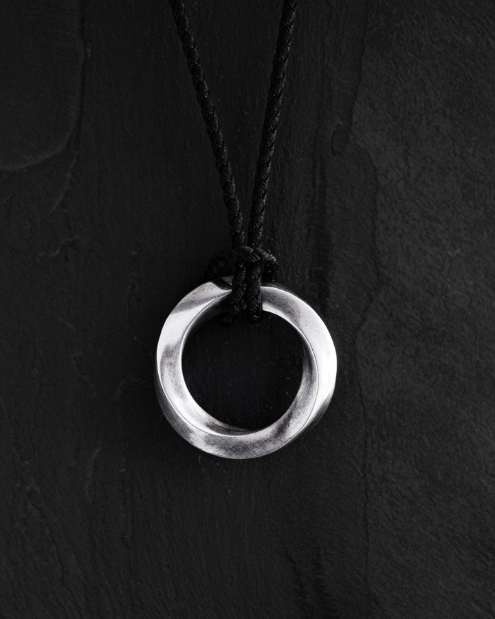 Silver pendant INFINITE LOOP (on cord)