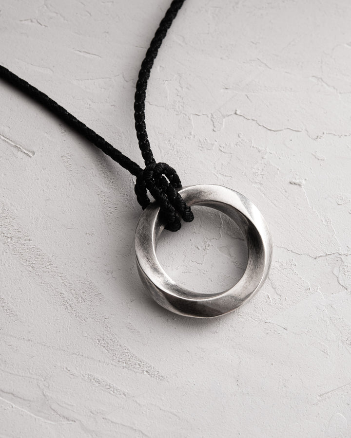 Silver pendant INFINITE LOOP (on cord)
