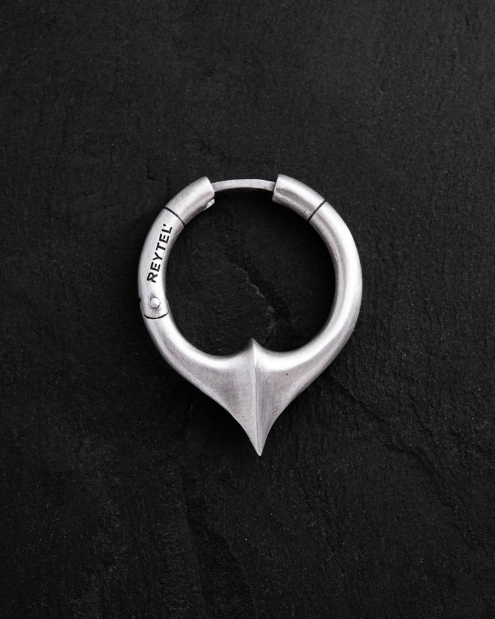 Silver single earring REBELLION