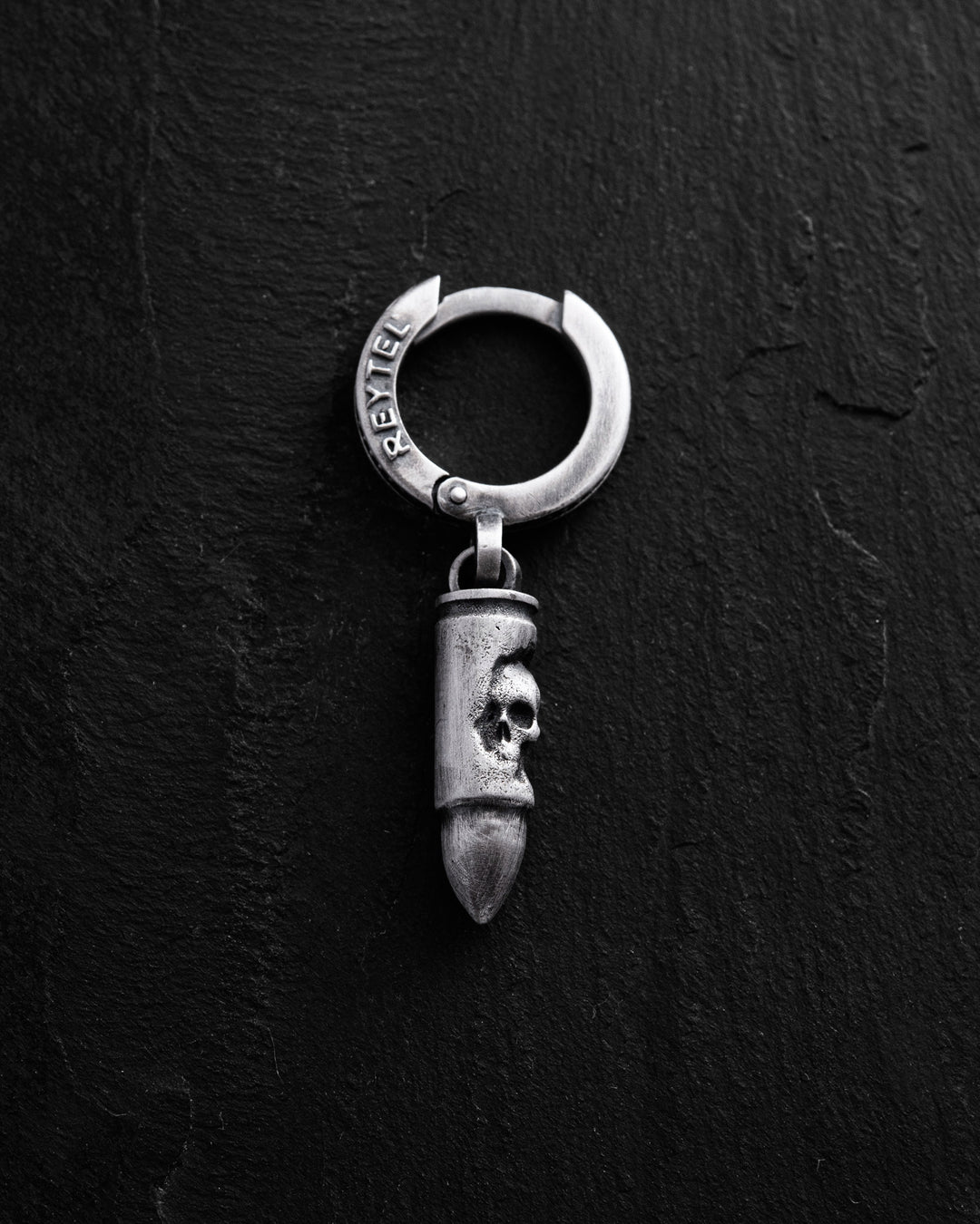 Silver single earring BULLET. MEMENTO MORI