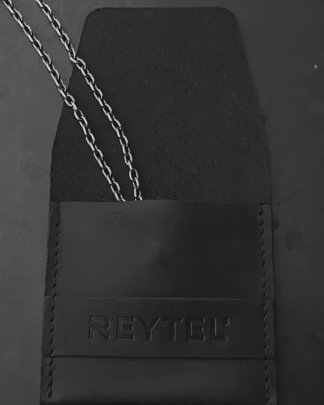 Silver structured cross dog tag with a STRUGGLE