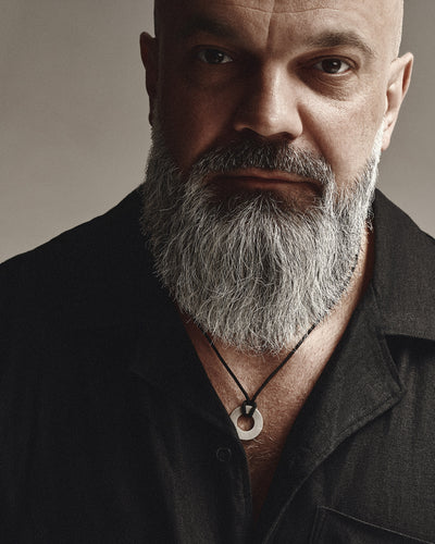 Silver pendant METAM (on a string)