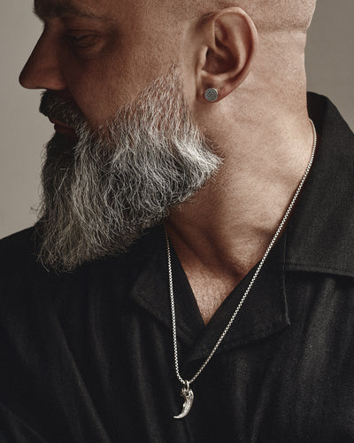 Silver single earring BEAR'S PAW. RUNES