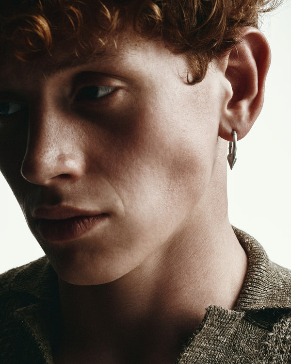 Silver single earring REBELLION