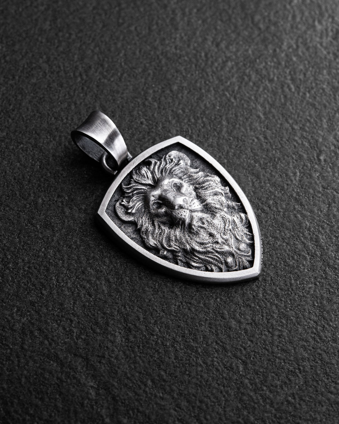 Silver pendant THE WISDOM OF THE LION