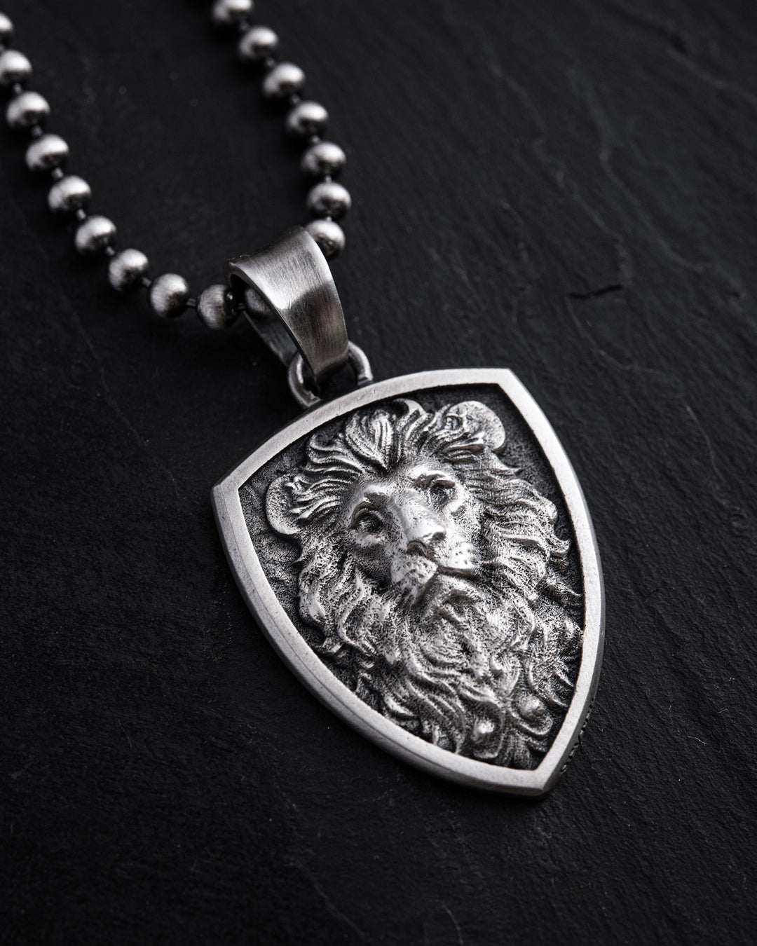 Silver pendant THE WISDOM OF THE LION