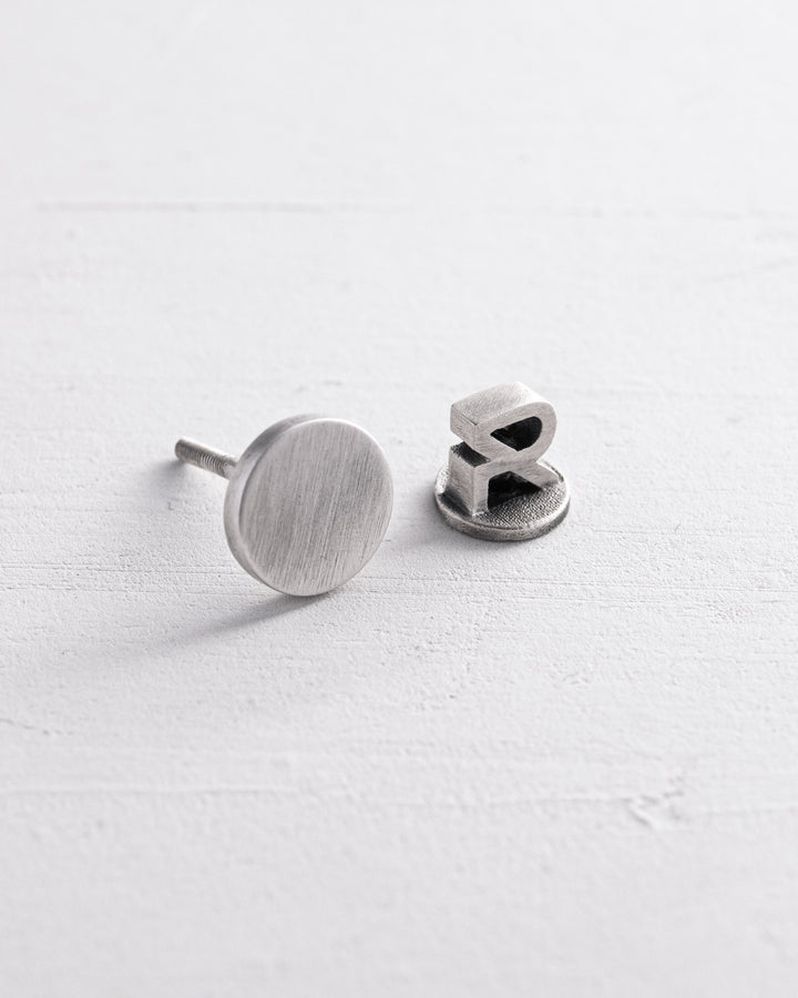 Silver single earring PUNKT