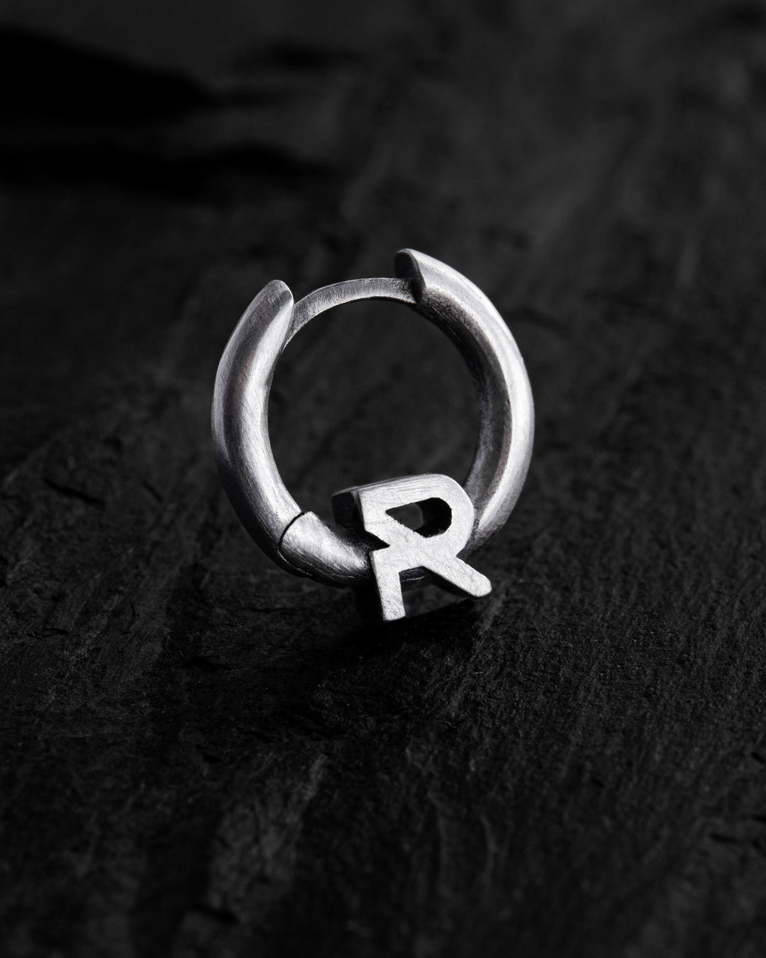 Silver single earring REYTEL