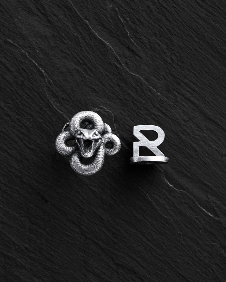 Silver single earring SERPENS