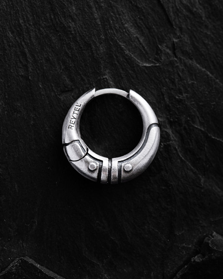 Silver monoearring AXE