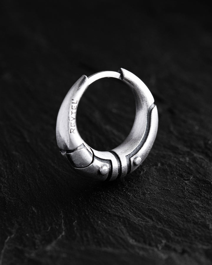 Silver monoearring AXE