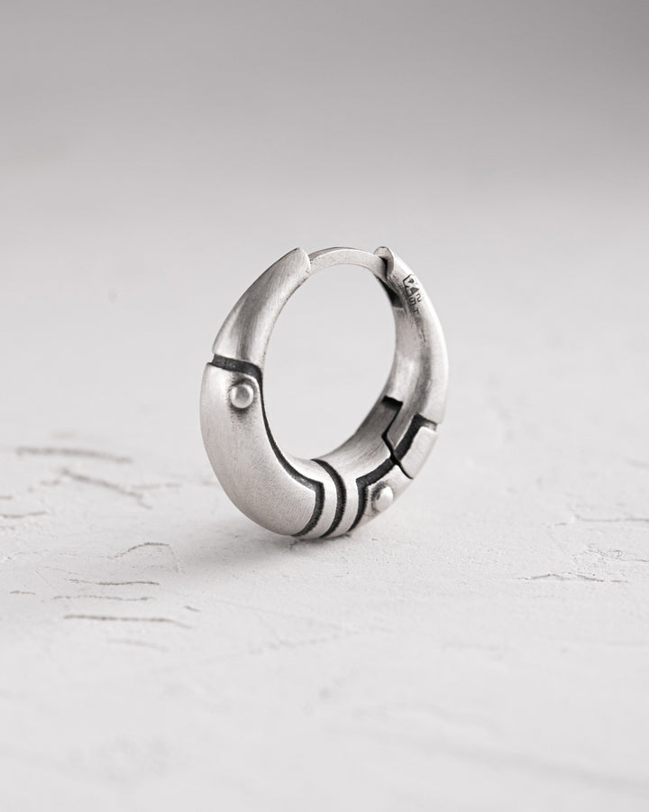 Silver monoearring AXE