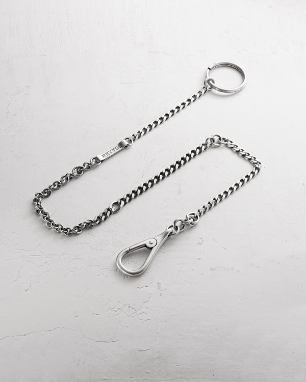 Silver key chain UNBOUND