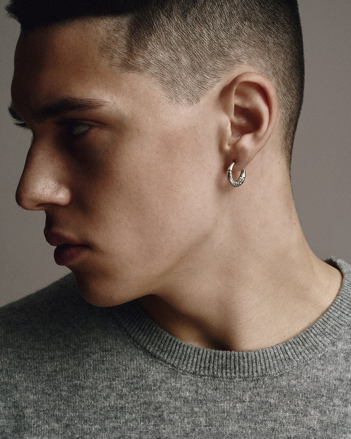 Silver monoearring AXE